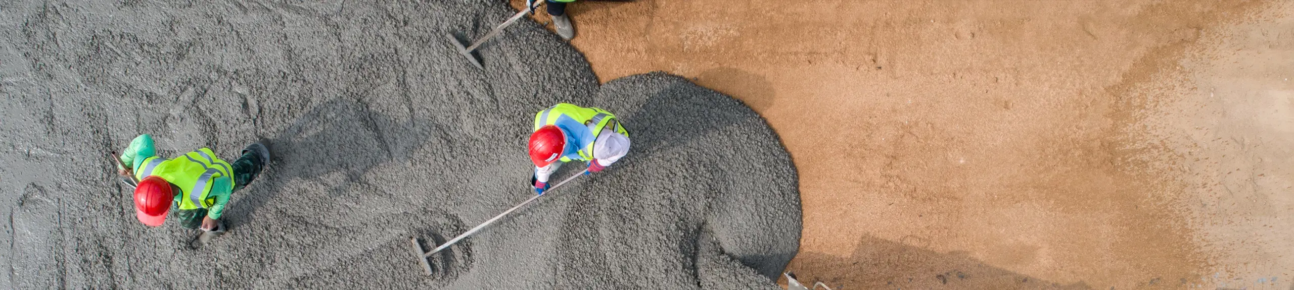 Aerial view of concrete being laid Aerial view of concrete being laid