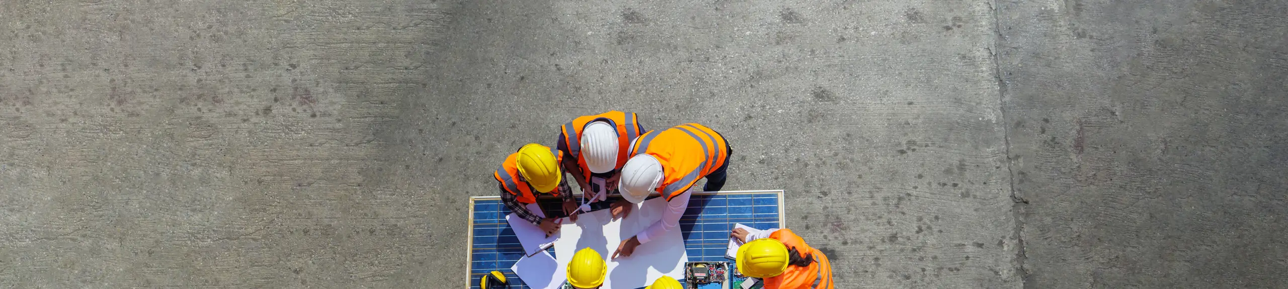 Aerial view of construction workers Aerial view of construction workers